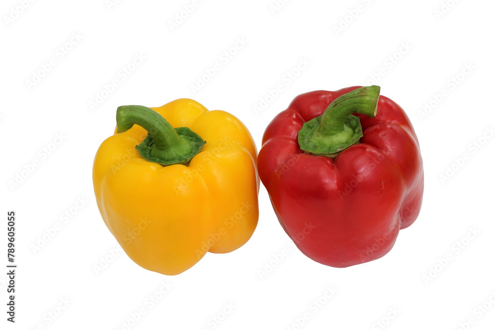 Yellow and red bell peppers on a white background, essential food ingredients Yellow and red bell peppers on a white background, essential food ingredients
