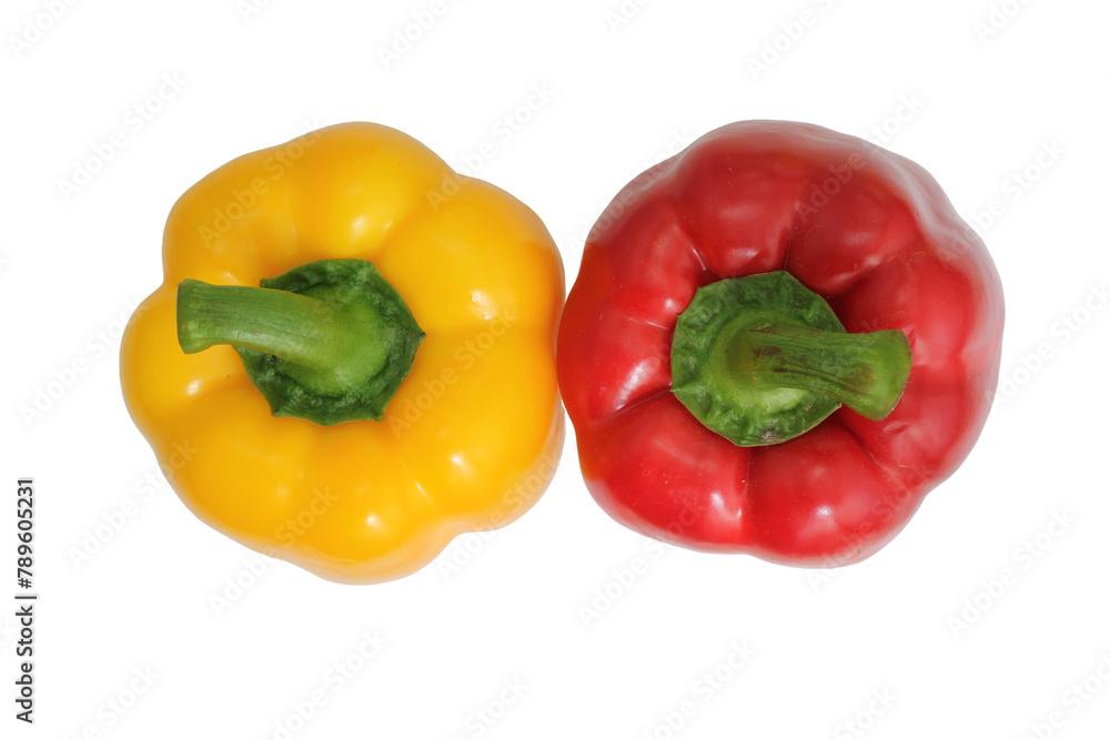 Yellow and red bell peppers on a white background, essential food ingredients Yellow and red bell peppers on a white background, essential food ingredients