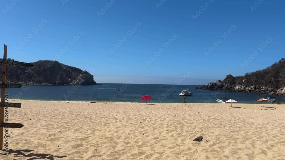 Hyperlapse of Cacaluta bay, people enjoying the sun and sea in Oaxaca, Mexico Hyperlapse of Cacaluta bay, people enjoying the sun and sea in Oaxaca, Mexico