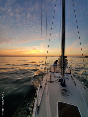 sailboat at sunset © David