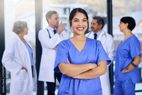 Team, hospital and portrait of nurse with crossed arms for medical service, insurance or collaboration. Professional, healthcare student and woman in clinic for wellness, medicare and consulting