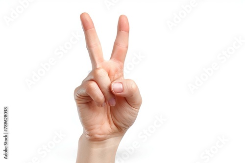 Two fingers gesture on white. Background with selective focus