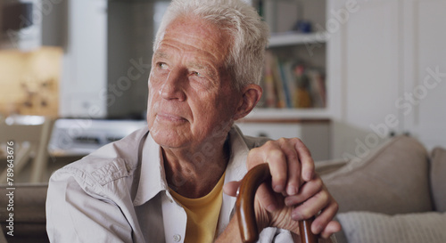 Senior man, thinking and walking stick in house sitting on sofa for retirement, relax and comfort. Elderly person, happy and cane in home for peace, calm and pension while being nostalgic with vision