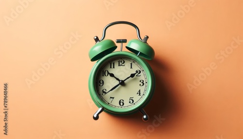 vintage alarm clock on light blue color background