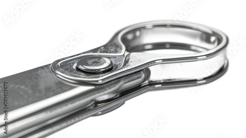 Can opener on isolated white background photo