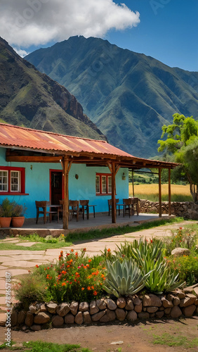 A breathtaking view of an empty restaurant cafe in the middle of the peruvian andes with the mountains in the background and a beautiful heavenly blue sky above. 