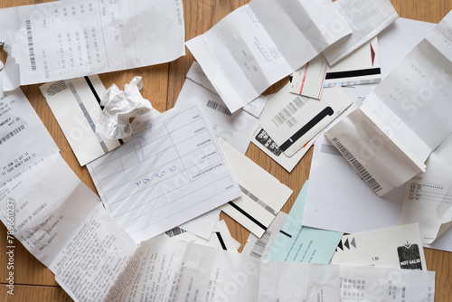 Close-Up Of Messy pile of Receipts and tickets on the floor - ugc  photo