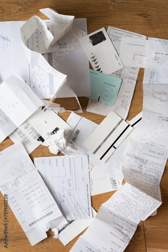 Close-Up Of Messy pile of Receipts and tickets on the floor - ugc  photo