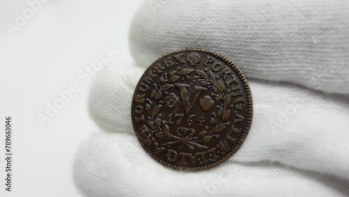 obverse and reverse of a Portuguese V reis coin in copper from the reign of José I dated 1764. numismatic collection photo