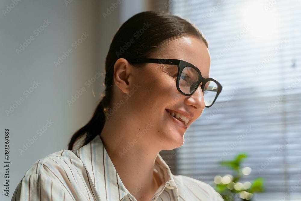 A woman with glasses