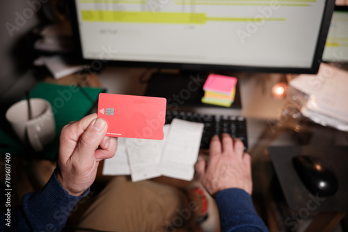 Anonymous hand with credit card making payments photo