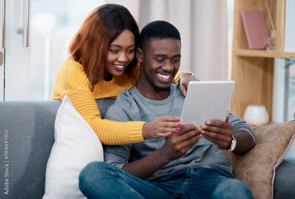 Black couple, tablet and online with digital app in home for streaming entertainment, movie or internet. Man, woman and relax in apartment with network subscription for watching, bonding or website Black couple, tablet and online with digital app in home for streaming entertainment, movie or internet. Man, woman and relax in apartment with network subscription for watching, bonding or website