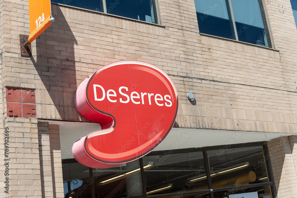 exterior building facade and logo sign of DeSerres, an art supply store