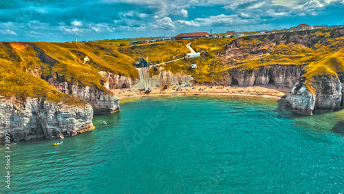 Beach in between cliffs landscape photo