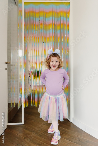 Cute girl on her birthday with pastel colored theme