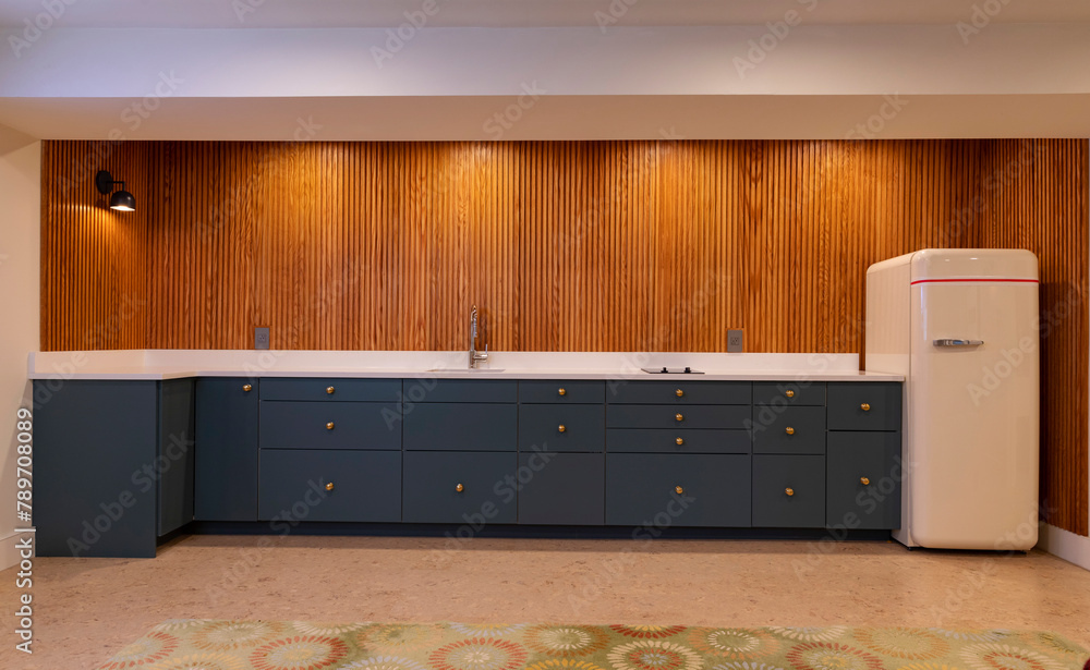 Vertical Wood Paneling in Modern Home Kitchen nice lighting Vertical Wood Paneling in Modern Home Kitchen nice lighting