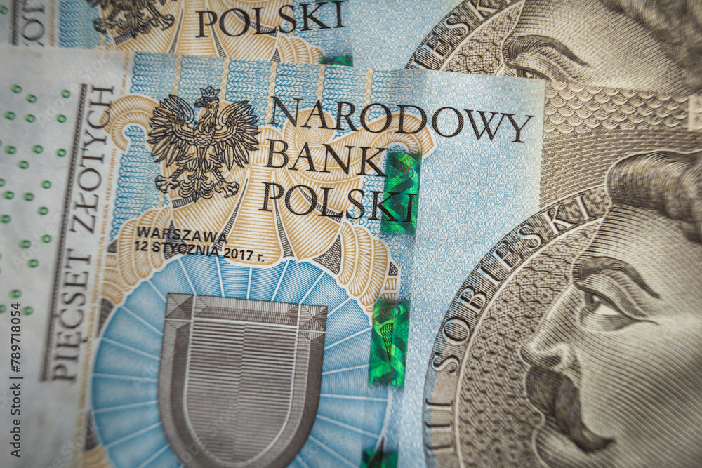 Narodowy bank Polski sign on Banknote economy in Poland inflation concept - obrazy, fototapety, plakaty 