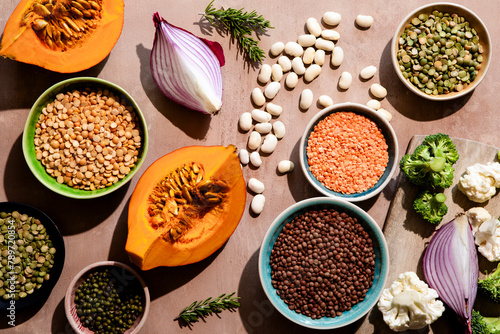 Food ingredients with lentils, beans and vegetables photo