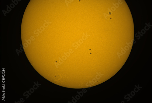 The Sun in visible light with sunspot, April 2024. During solar maximum, large numbers of sunspots appear