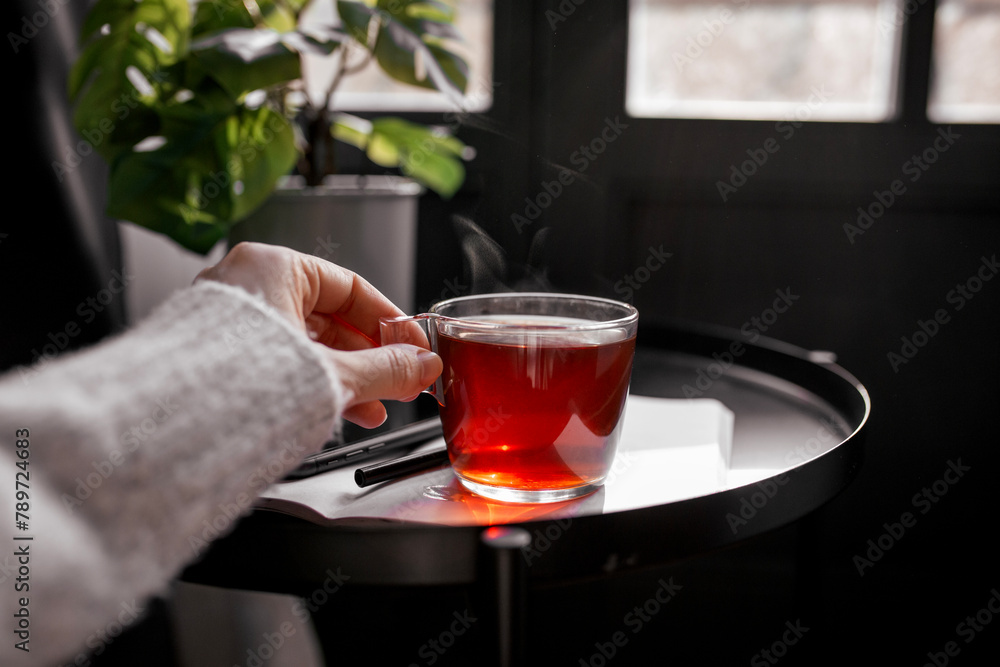 morning routine with cup of tea, notebook and phone morning routine with cup of tea, notebook and phone