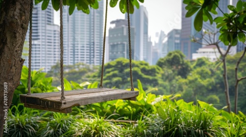 Closeup of a rustic wooden swing hanging from a sy tree branch and offering a peaceful vantage point to admire the city skyline and lush greenery of Terrace Treasures rooftop gardens. .