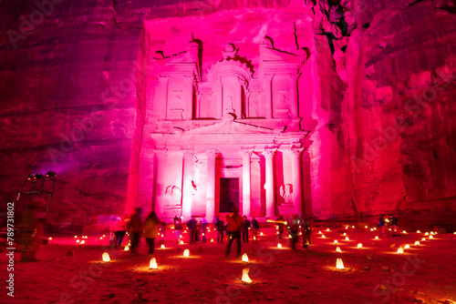 Illuminated treasury building in the acient Nabatean city of Petra by night, Jordan