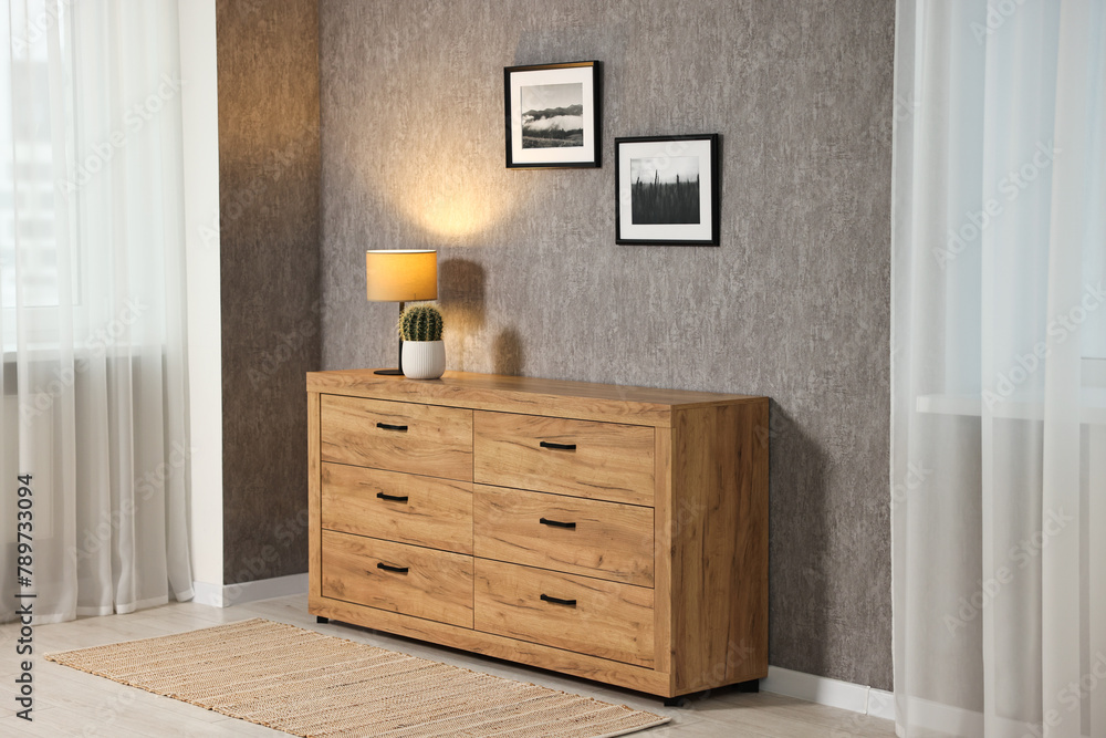 Home renovation. Room interior with stylish gray wallpaper on wall Home renovation. Room interior with stylish gray wallpaper on wall