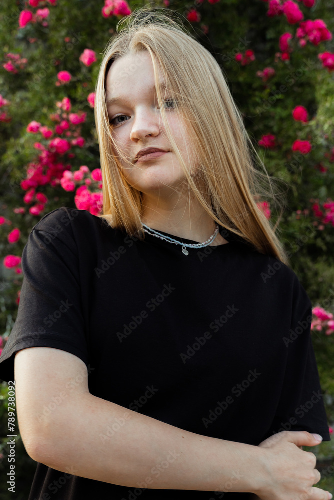 Portrait of teenager girl in black plain T-shirt Portrait of teenager girl in black plain T-shirt