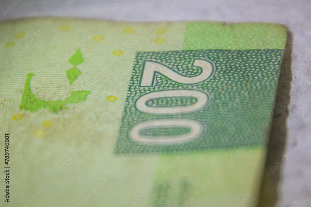 Obraz premium Macro close-up of a two hundred Mexican peso bill.