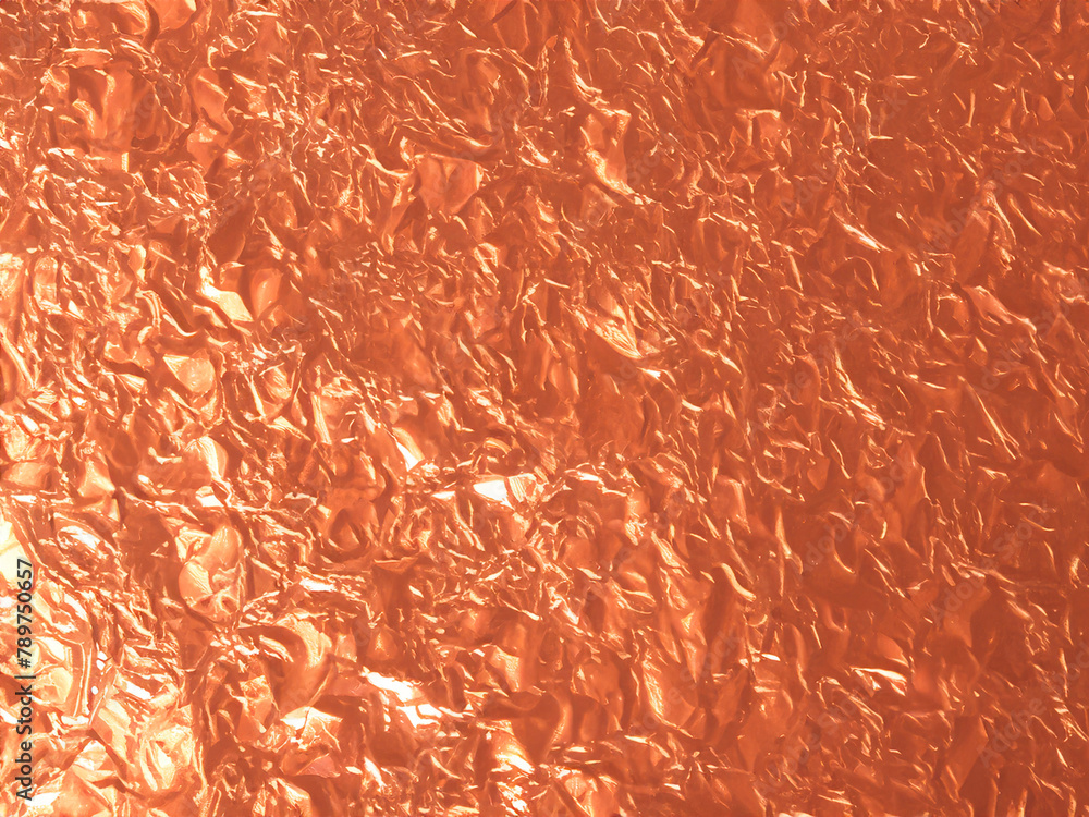 copper foil texture. abstract shiny background. shiny metallic foil background. copper foil texture. abstract shiny background. shiny metallic foil background.
