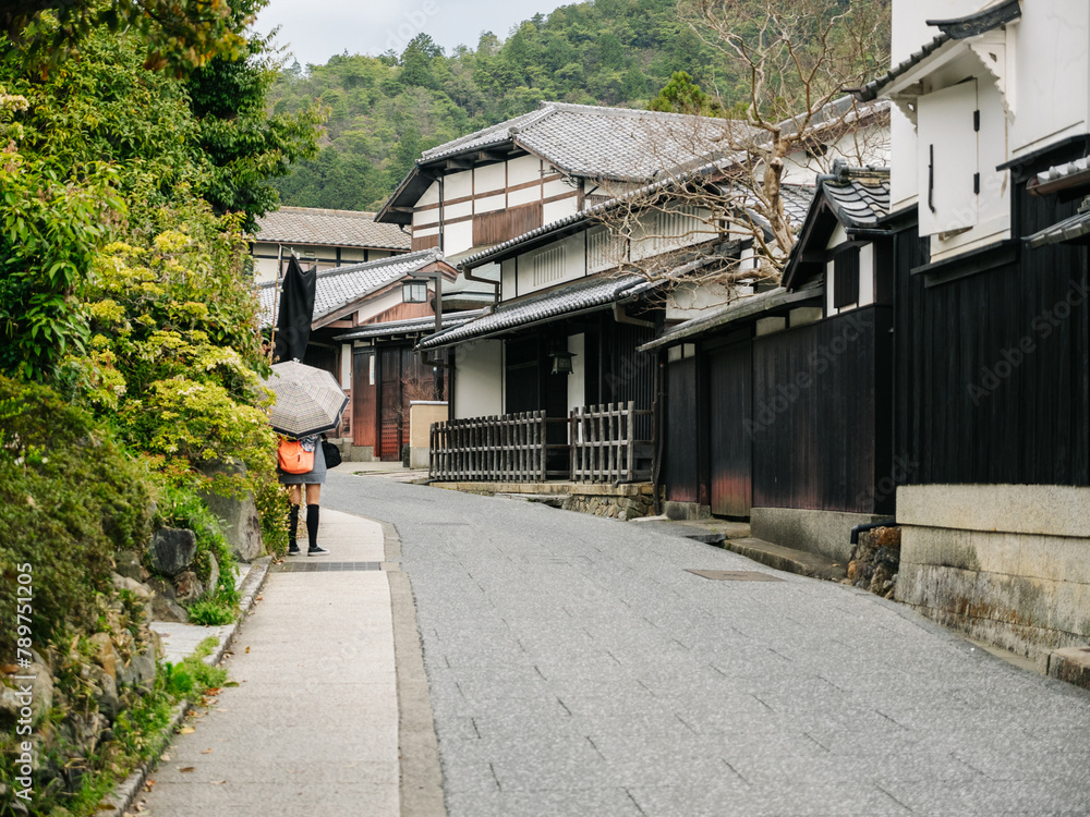 Street with old wooden houses in a neighborhood of japanese town Street with old wooden houses in a neighborhood of japanese town