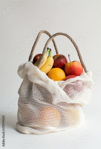 basket of fruit, **a white cloth bag filled with fruit on a white background, in the style of infinity nets, uhd image, pentax k1000 . photo
