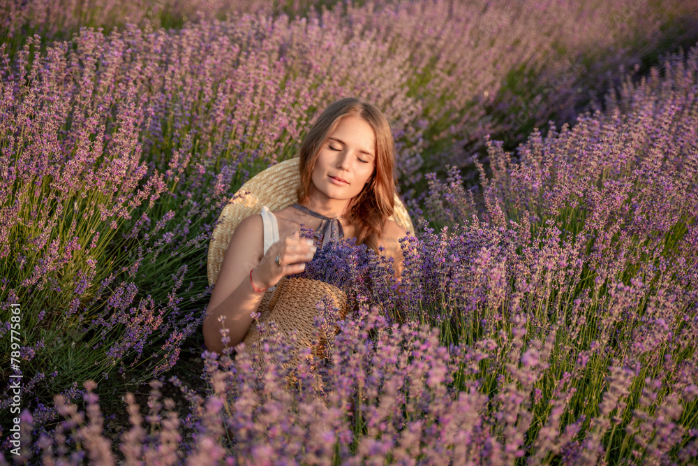 A woman is sitting in a field of lavender flowers. She is wearing a straw hat and holding a basket of flowers. The scene is peaceful and serene, with the woman enjoying the beauty of the flowers. A woman is sitting in a field of lavender flowers. She is wearing a straw hat and holding a basket of flowers. The scene is peaceful and serene, with the woman enjoying the beauty of the flowers.