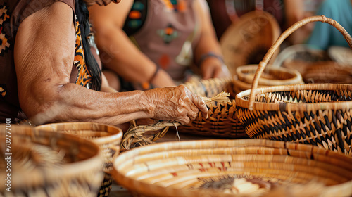 close up hands of Native American old woman making traditonal Basket. photo