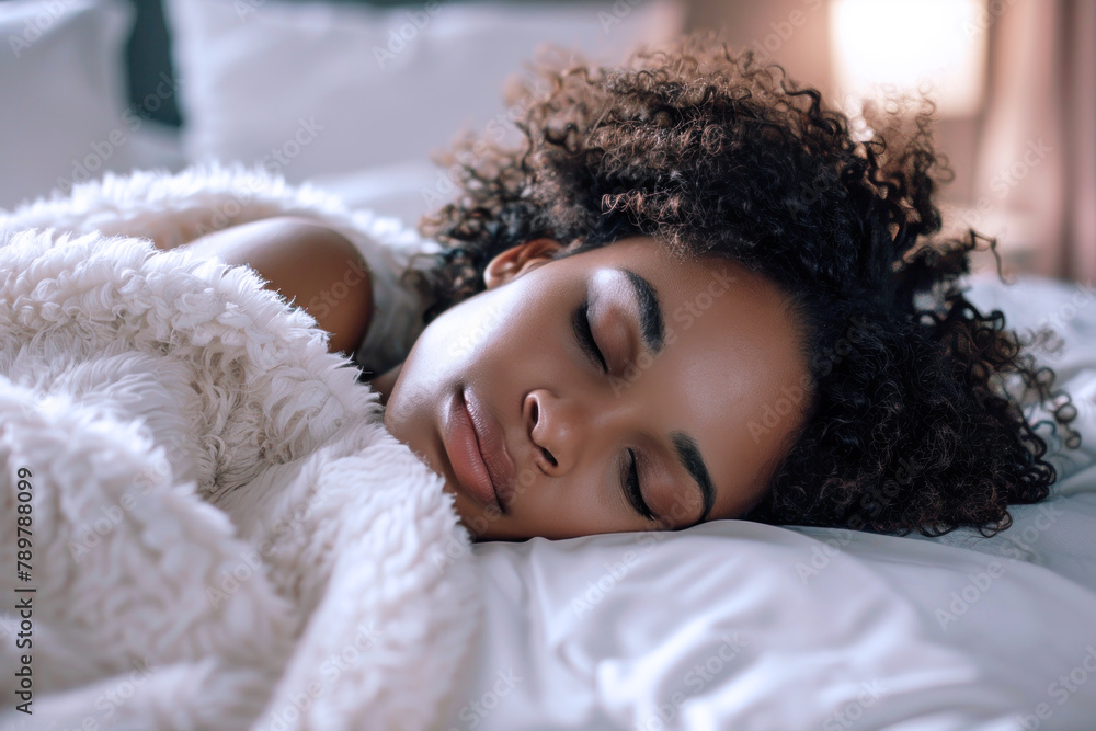Afro woman sleeping peacefully in the bedroom of a luxury hotel Afro woman sleeping peacefully in the bedroom of a luxury hotel