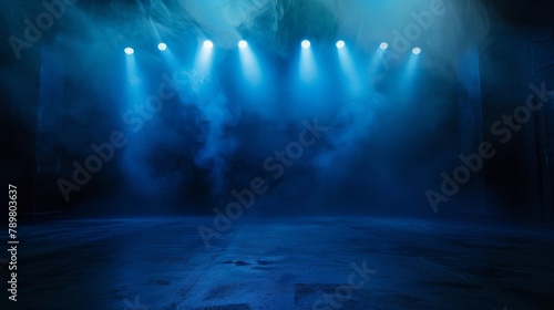 Blue spotlights on an empty stage. © Sittipol 
