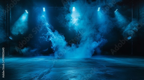Blue stage with spotlights and smoke
