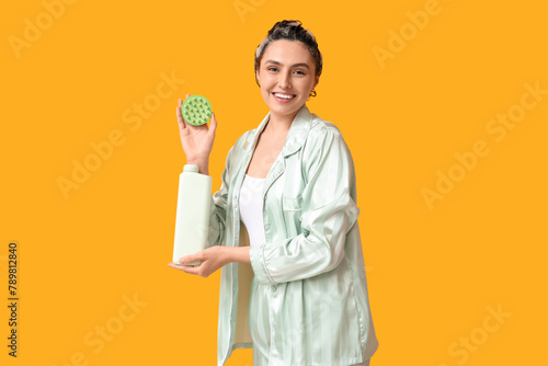Happy young woman with hair...