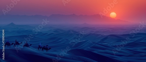A group of camels are riding across a desert at sunset
