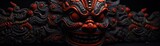 Closeup of a handcrafted demon mask used in traditional ceremonies, displaying rich textures and cultural symbolism