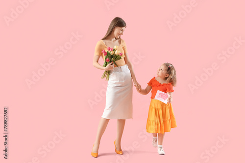 Little girl and her mom wit...