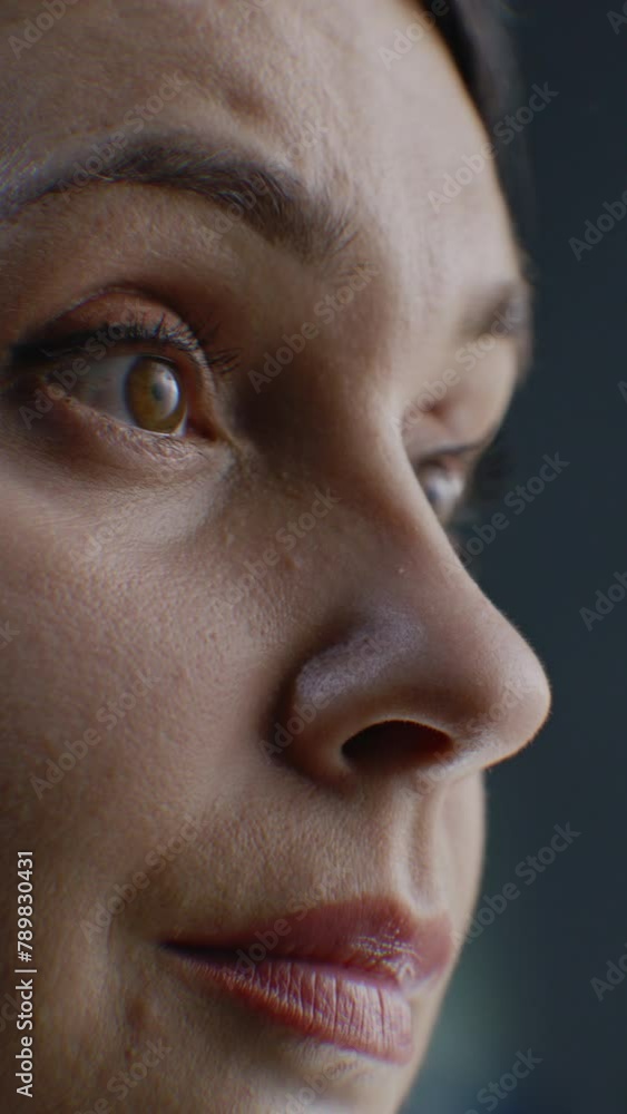 Close up face portrait of adult caucasian woman with focused look. 3D animation of human futuristic AI biometric facial recognition system. Neural network. Vertical shot Close up face portrait of adult caucasian woman with focused look. 3D animation of human futuristic AI biometric facial recognition system. Neural network. Vertical shot