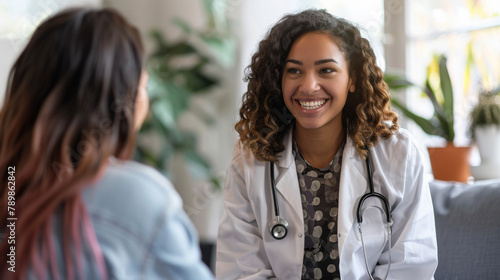 Friendly doctor smiling during a patient consultation