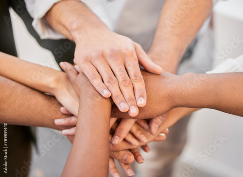 Teamwork  above or business people with hands in stack for mission goal  collaboration or community. Empower  partnership or employees in meeting for support  solidarity or group motivation in office