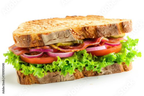  Hearty Whole Grain Sandwich Stacked with Fresh Vegetables and Deli Meat