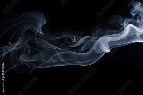 Abstract and Mysterious White Smoke Flowing Gently Against a Black Background