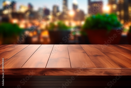 Empty wooden table in front of night city light abstract blurred  background for product display in a coffee shop  local market or bar