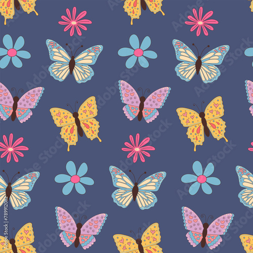 Butterflies and flowers seamless pattern on dark blue background.