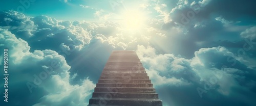 Stairs leading to the sky, surrounded by clouds and sunlight. The stairs create an upward visual effect with soft colors. In front of them is another set of stairs leading up into heaven. 