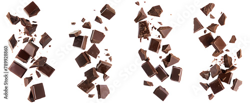 Set of pieces of dark chocolate falling close up on a white background